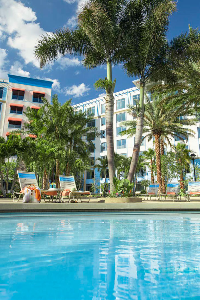 Relax poolside at Universal Orlando's newest on-site hotel Loews Sapphire Falls Resort.