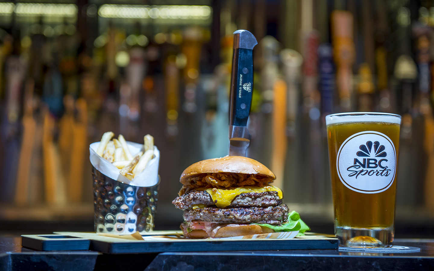 Get a juicy Grand Slam Burger from NBC Sports Grill and Brew at Universal Orlando's CityWalk. 