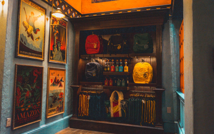 Backpacks and posters on display at the Globus Mundi store.