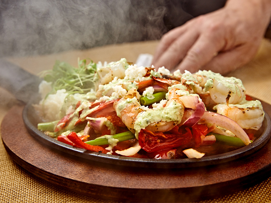 Sizzling Fajitas at Confisco Grille