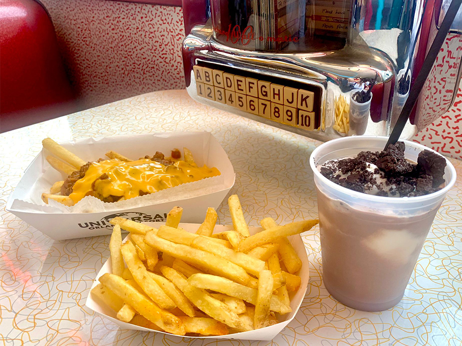 Fries and milkshake with jukebox on the background