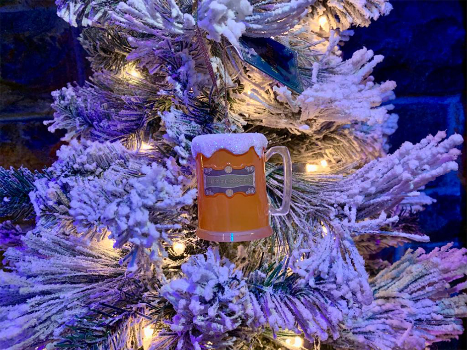 Butterbeer Ornament on snowy Christmas Tree WWoHP Holidays