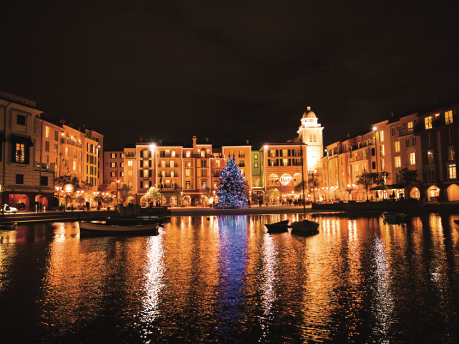 Portofino Bay Hotel at night from across the bay with Christmas Tree