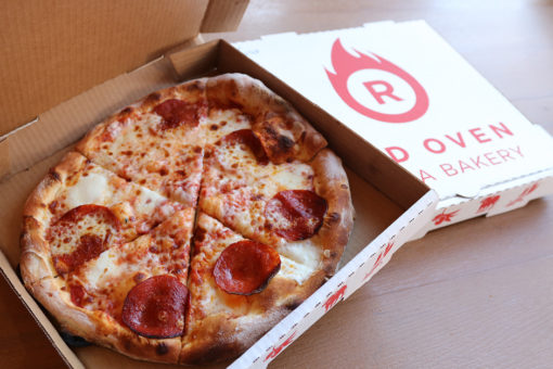 Big Eyed Pepperoni Pizza inside Red Over Pizza Box