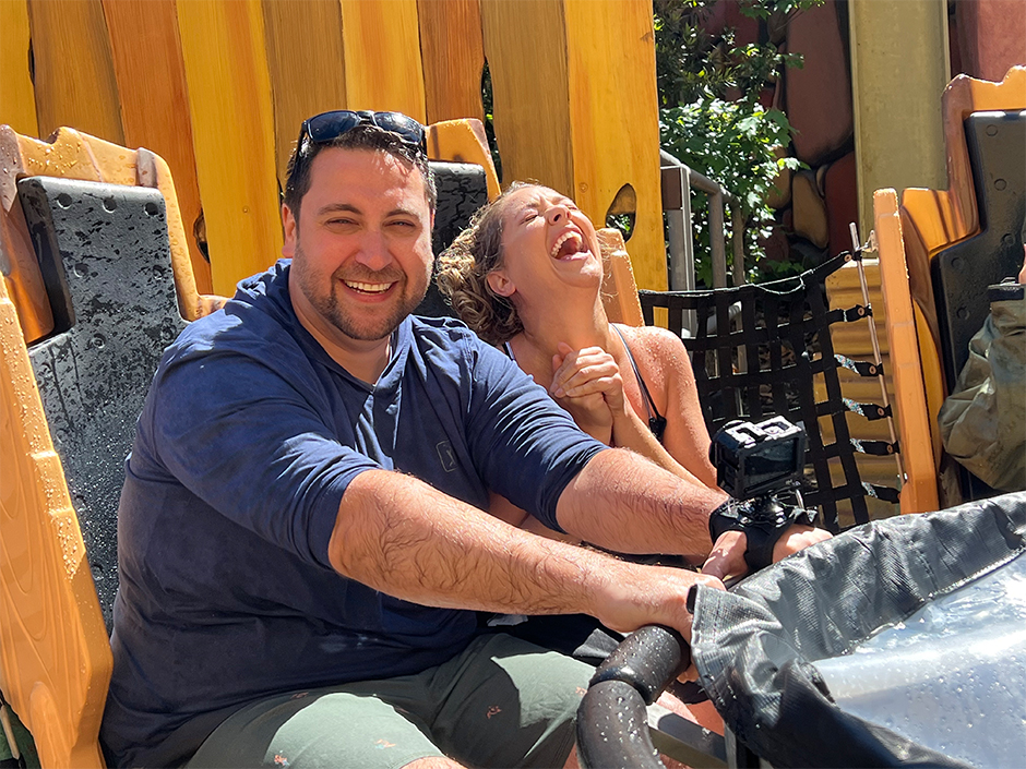 Man and woman having a good time, smiling on Popeye's water ride at Universal Islands of Adventure