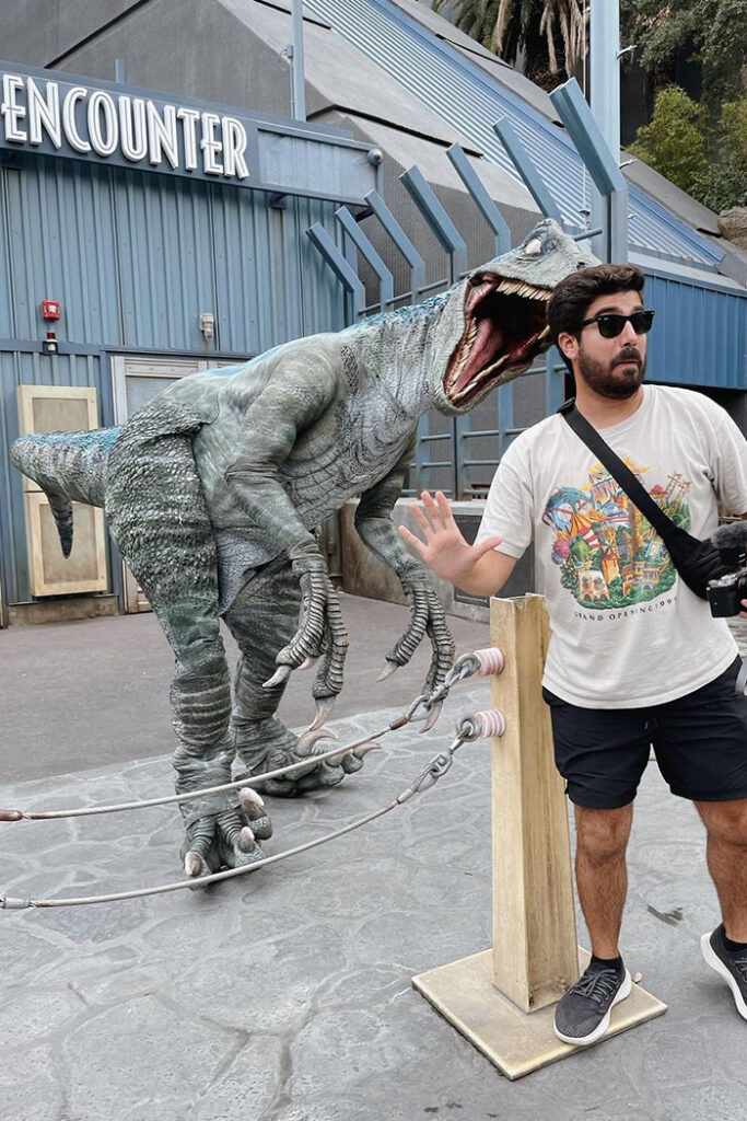 Guest posts with Blue the velociraptor in Jurassic World.