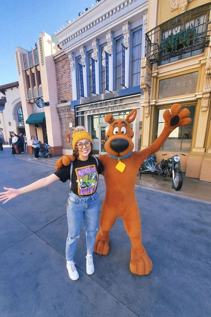 Park guest poses with Scooby-Doo at Universal Studios Hollywood.