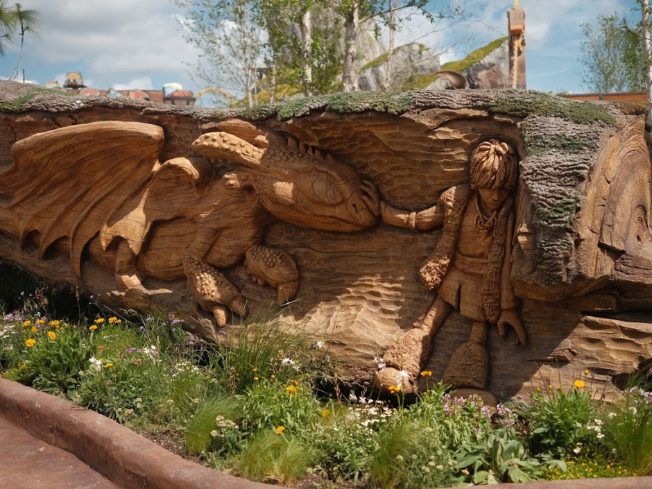 A carving of Hiccup meeting Toothless in How to Train Your Dragon - Isle of Berk