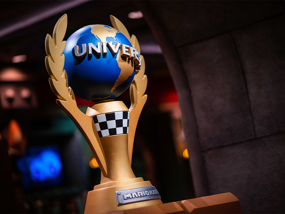 Universal Cup at Mario Kart: Bowser's Challenge with a dark background.