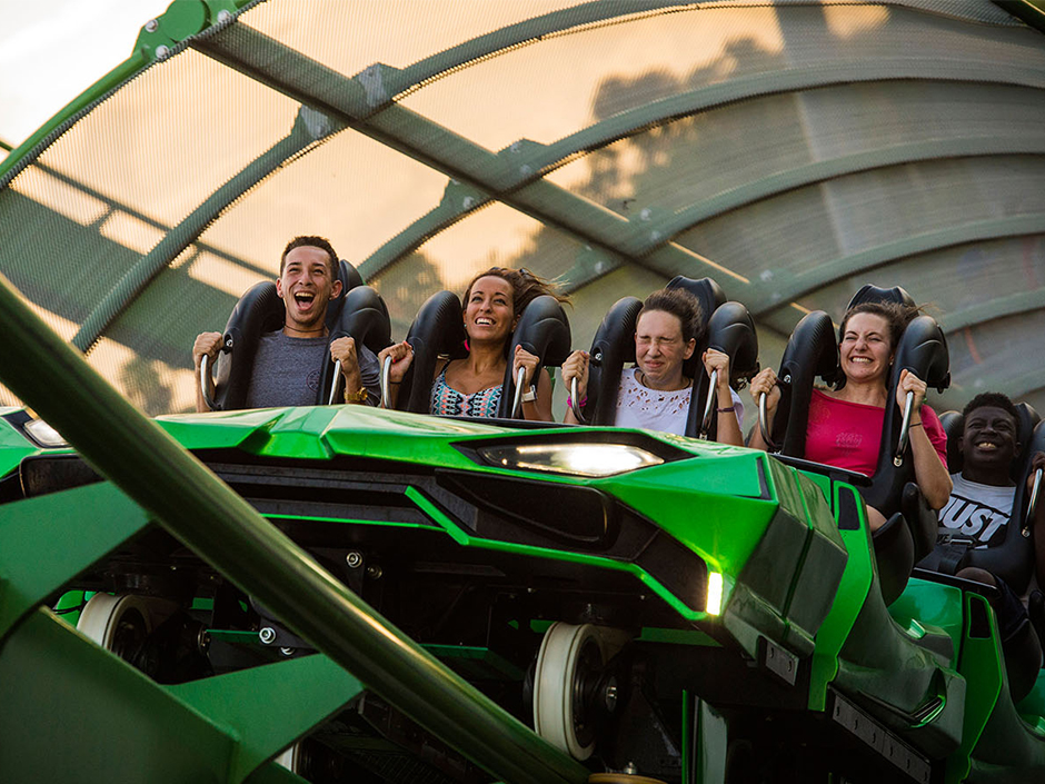 A group of teens on the Incredible Hulk Coaster