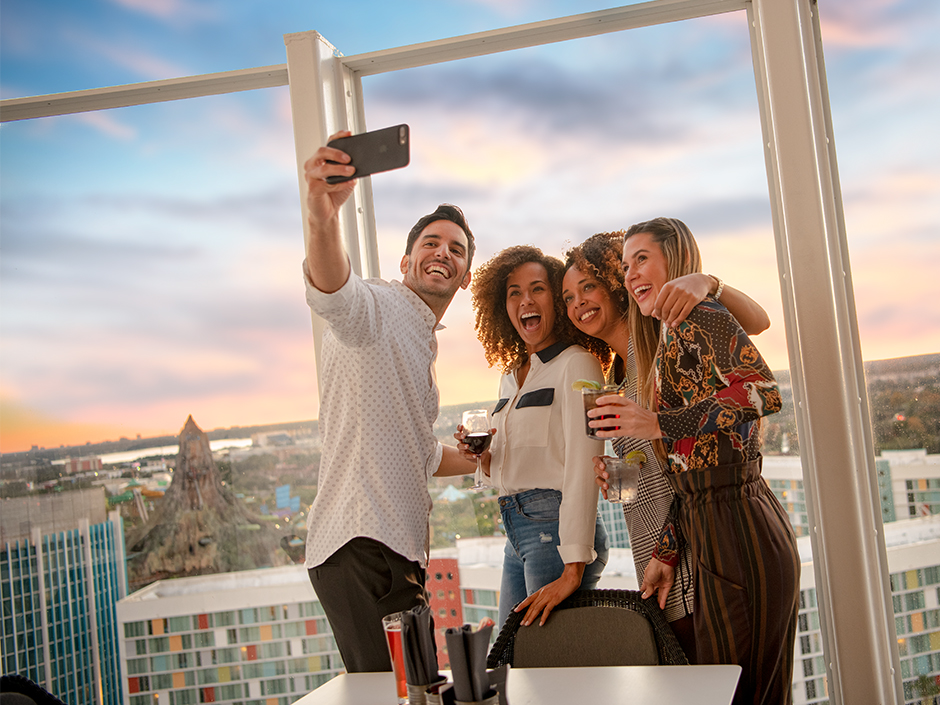 4 people smiling for a selfie at Bar 17 Bistro.