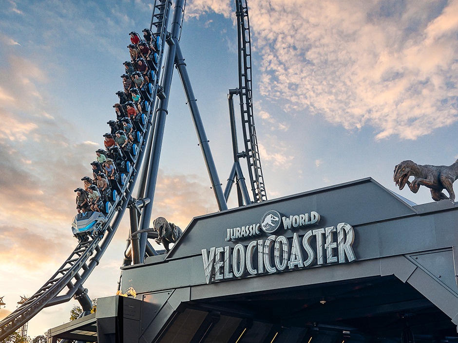 People riding the VelociCoaster.