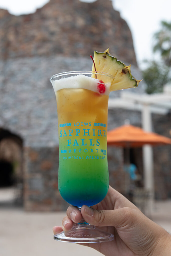 A colorful cocktail in front of Drhum Klub