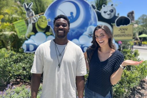 Cassie and Dylan, Discover Universal Podcast hosts, in DreamWorks Land