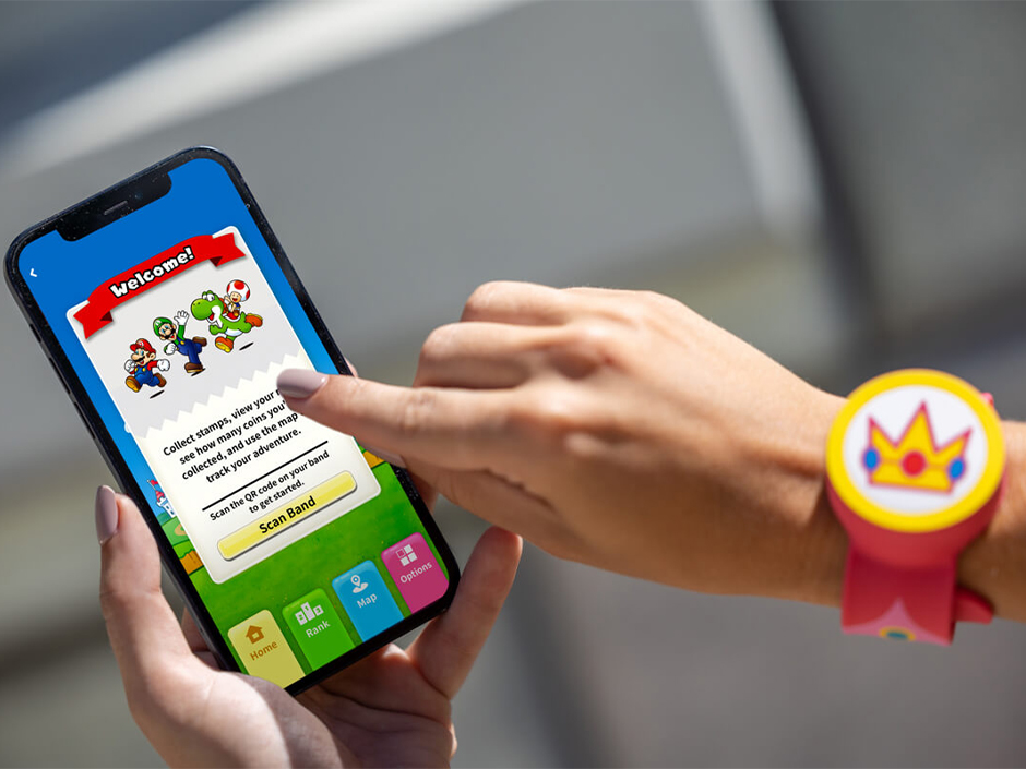 A guest navigates the SUPER NINTENDO WORLD section of the Universal Studios Hollywood app.