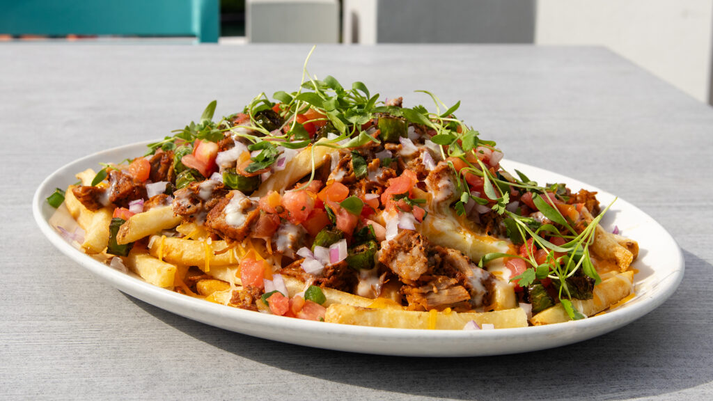 Loaded Green Chile Fries at Margaritaville for Veterans and Military Families Appeciation Month at Universal CityWalk.