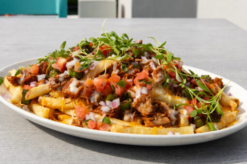 Loaded Green Chile Fries at Margaritaville for Veterans and Military Families Appeciation Month at Universal CityWalk.