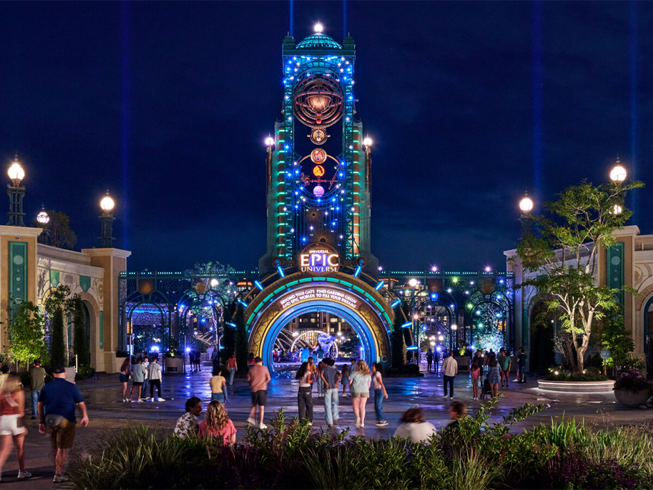 Guests walking through the Chronos in Celestial Park at night