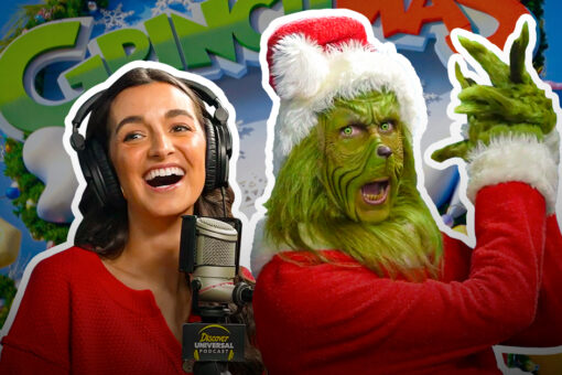 Cassie, host of the Discover Universal Podcast, poses with the Grinch