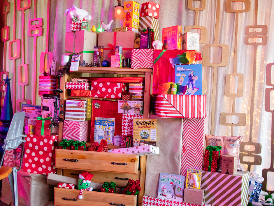 Mound of wrapped presents at the White Elephant Bar in Green & Red Coconut Club.