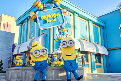 Minions in front of sign for Minion Land