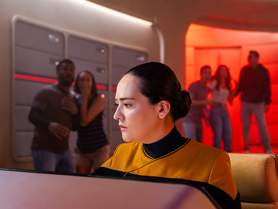 Guests watching an actor aboard Enterprise D at Star Trek: Red Alert at Universal Fan Fest Nights.