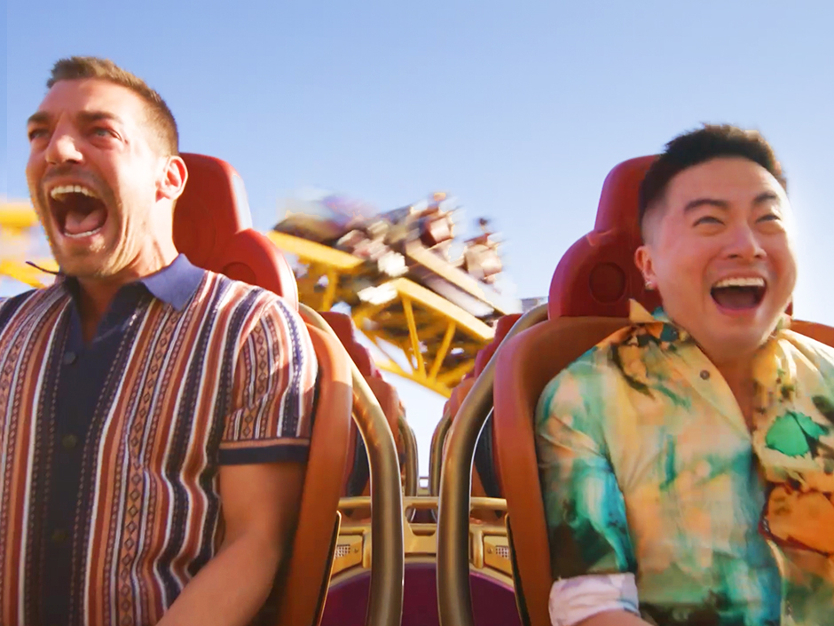 Bowen Yang and Matt Rogers riding Stardust Racers at Epic Universe