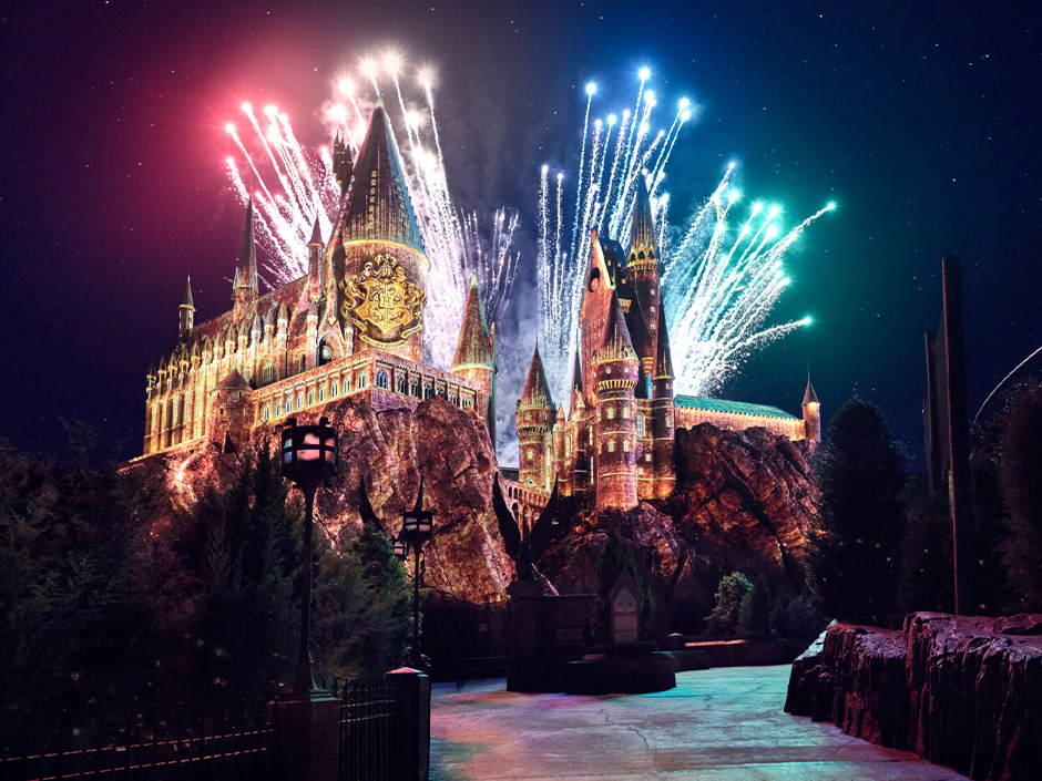 Fireworks in front of Hogwarts castle during Hogwarts Always