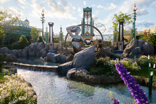 The Luna statue in front of the Chronos at Celestial Park in Epic Universe