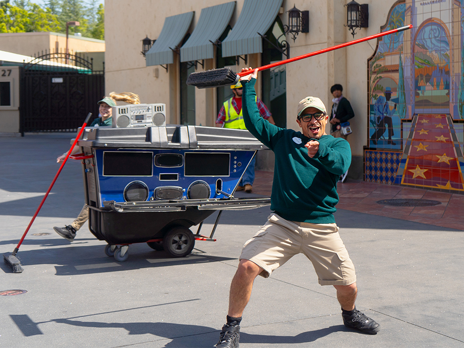 Street Sweeper Lenny dancing with a broom