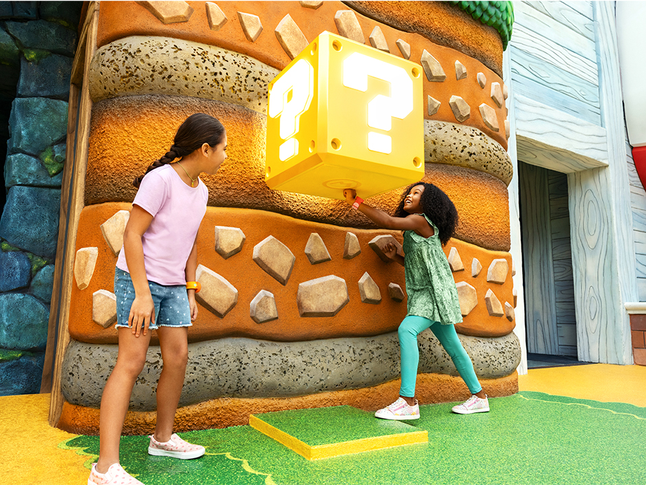 Kids collecting coins with their Power Up Bands