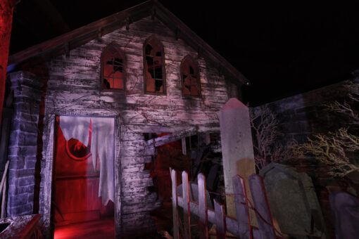 The schoolhouse facade in Hatchet & Chains: Demon Bounty Hunters