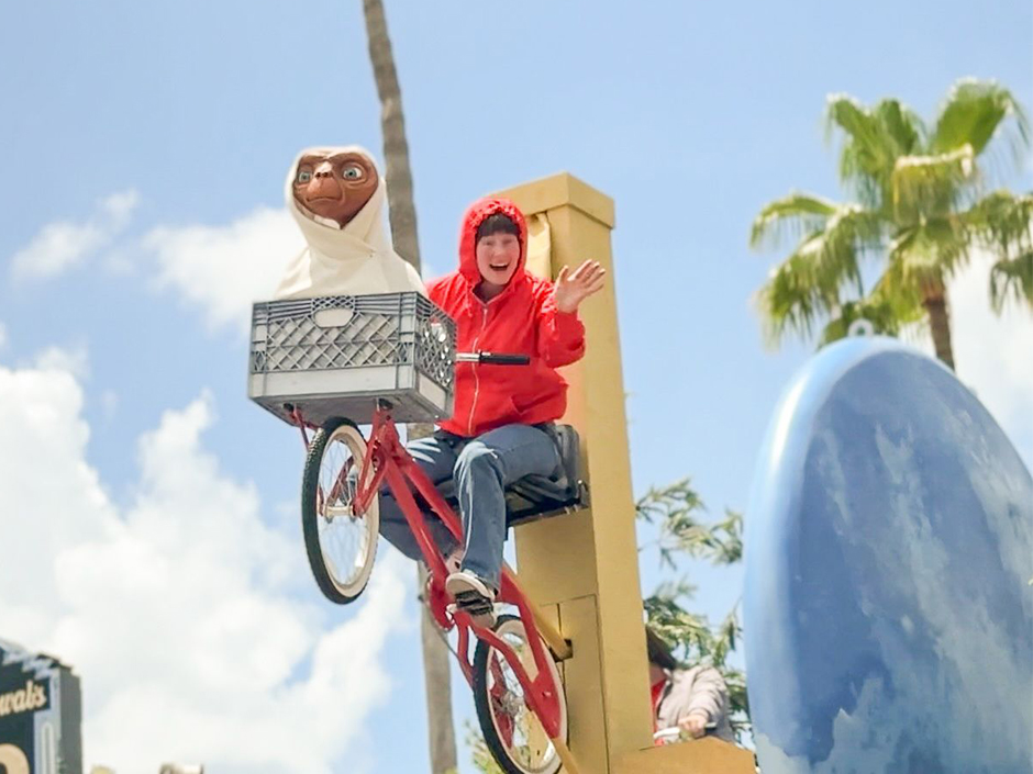 ET characters flying through the air at Mega Movie Parade