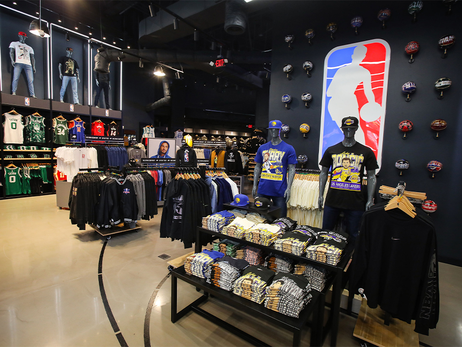 NBA merchandise on tables and racks in the NBA Store on CityWalk.