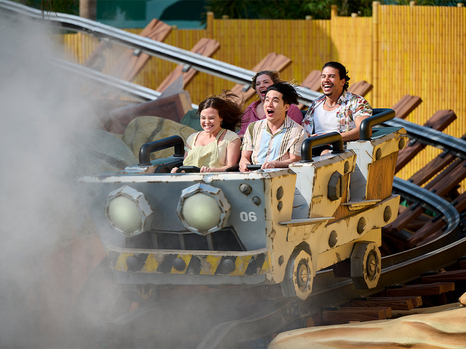 A family riding Mine-Cart Madness in SUPER NINTENDO WORLD