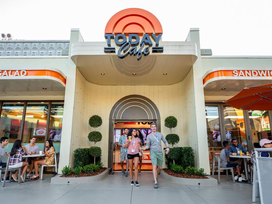 A couple walks out of Today Cafe in Universal Studios Florida