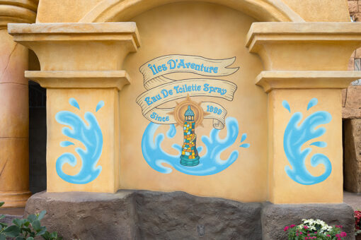 A mural of a lighthouse topped with a perfume nozzle in Universal Islands of Adventure