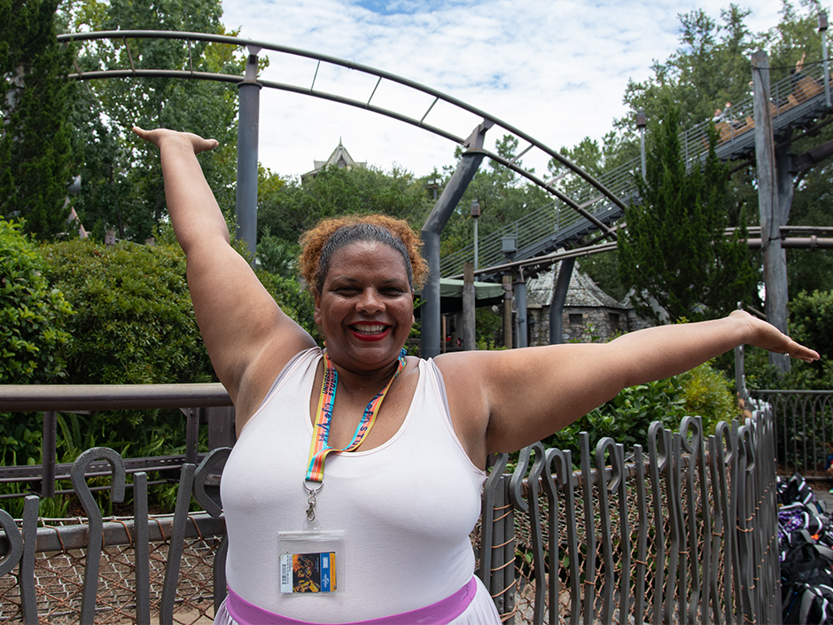 Maria posing in front of Flight of the Hippogriff at Universal Islands of Adventure.