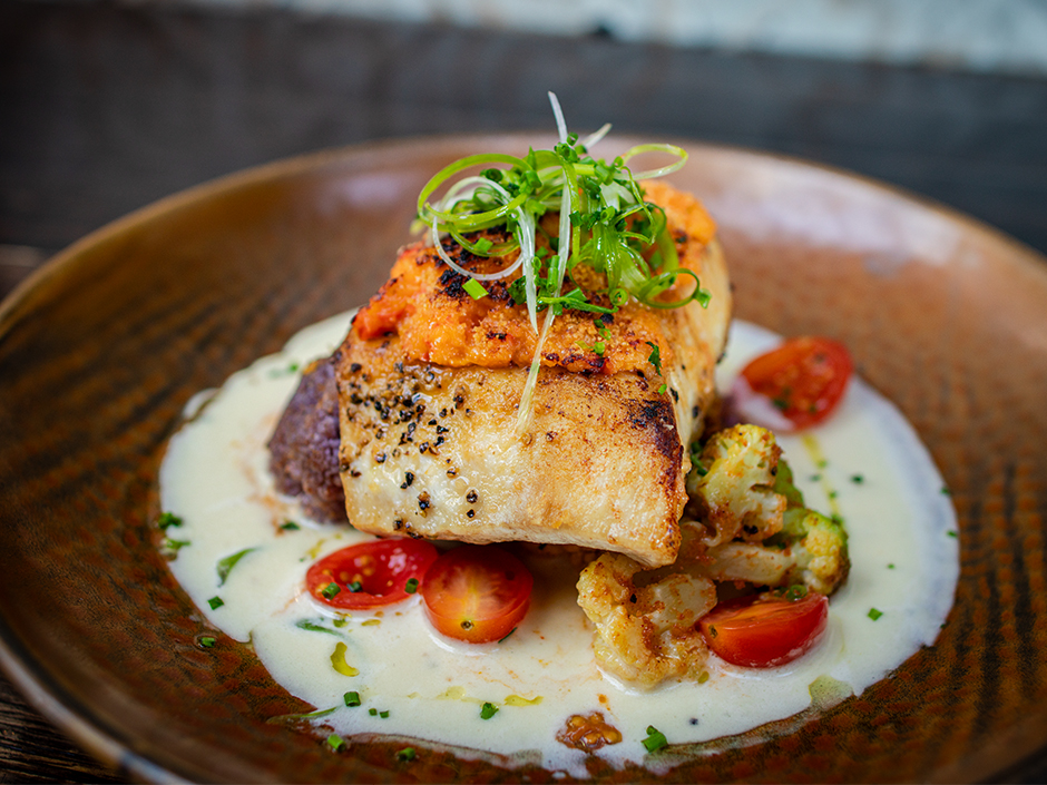 Plate of Broiled Swordfish over citrus-white wine velouté at Toothsome in Universal CityWalk.