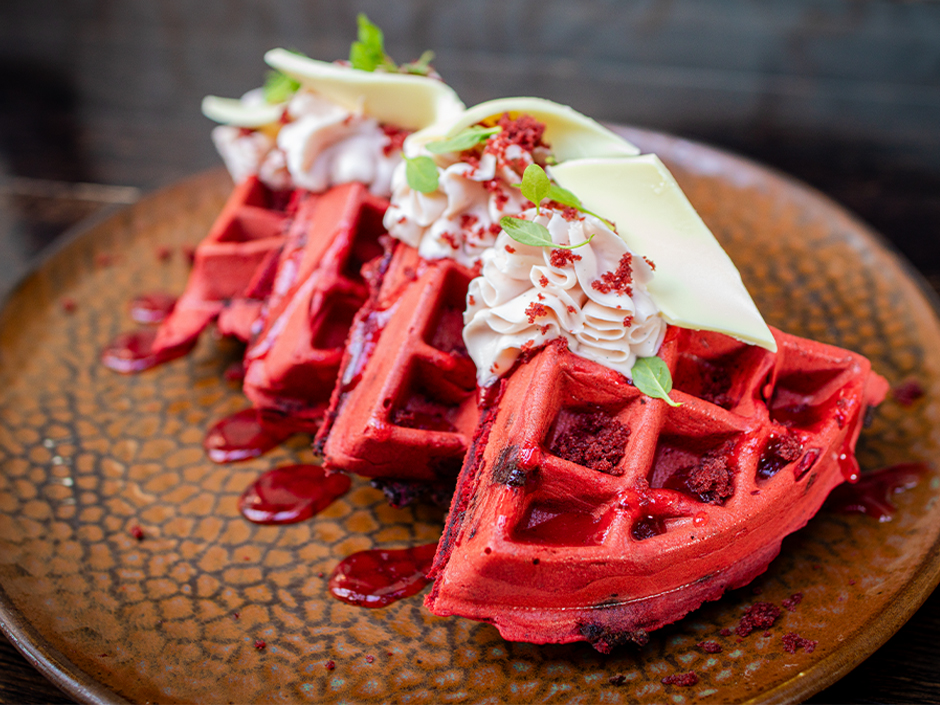 Plate of Penelope's Red Velvet Waffle at Toothsome in Universal CityWalk for Valentine's Day.