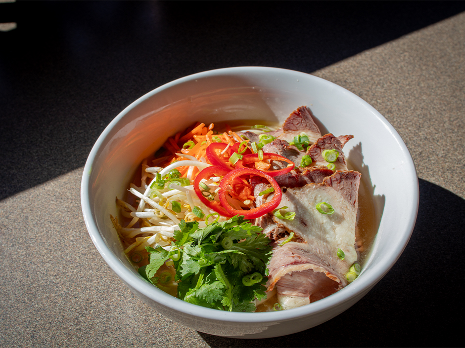 Bowl of Smoked Brisket Pho at Mythos Restaurant for Lunar New Year at Universal Islands of Adventure.