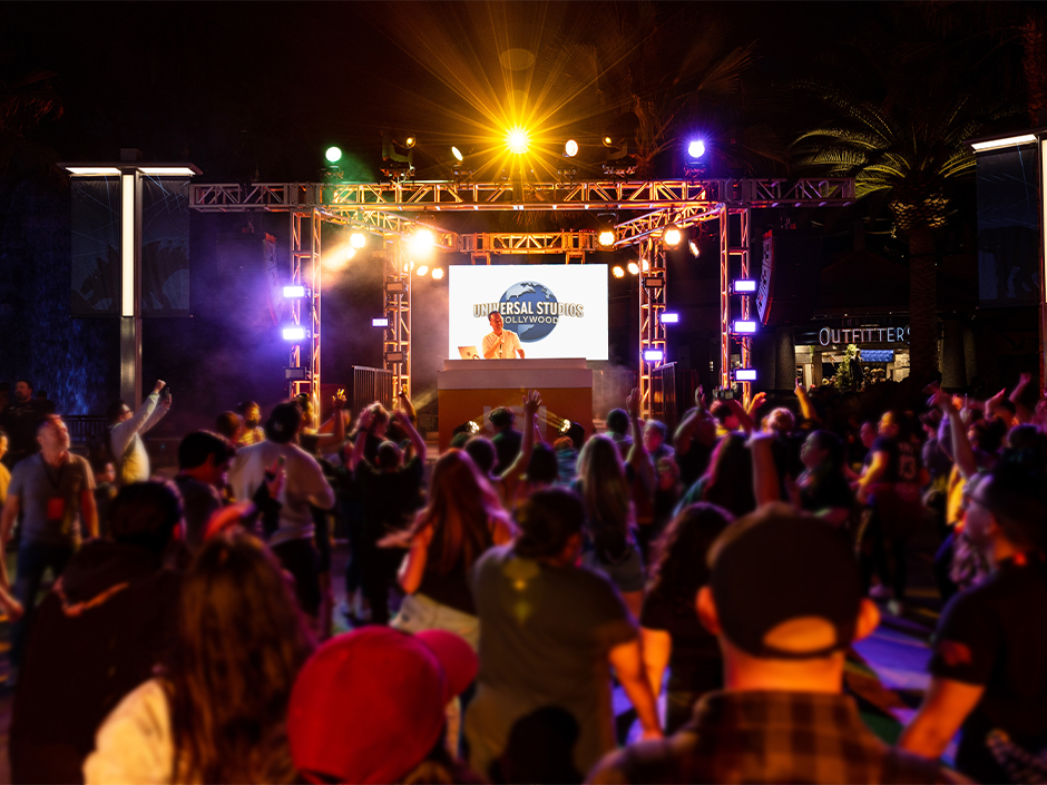 A DJ set during a Pass Member Park Takeover at USH.