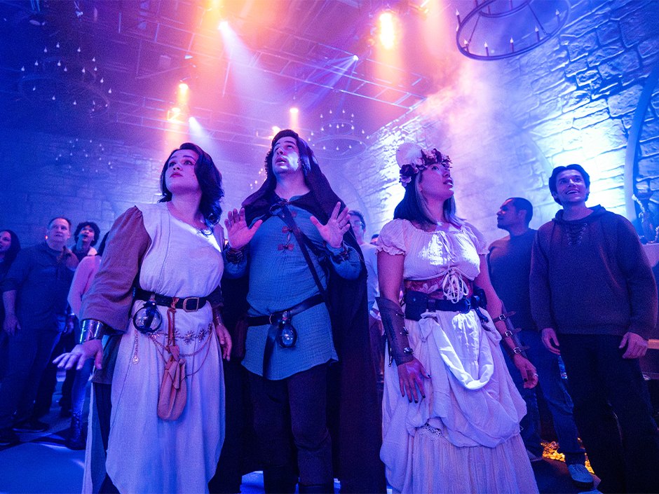 Guests take in the DUNGEONS & DRAGONS: Secrets of Waterdeep experience at Universal Fan Fest Nights.