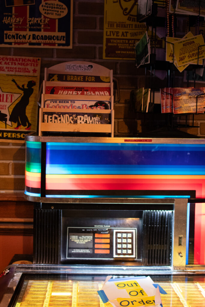 The jukebox with tributes to previous Universal Mardi Gras Tribute Stores inside this year's store