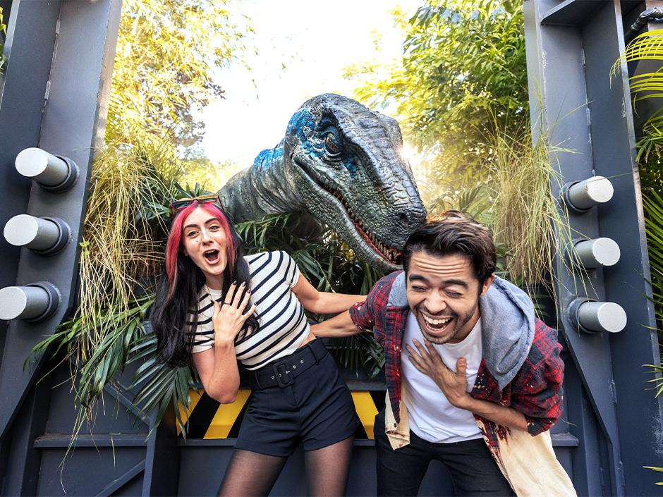 Two people frightened and laughing by a raptor encounter.