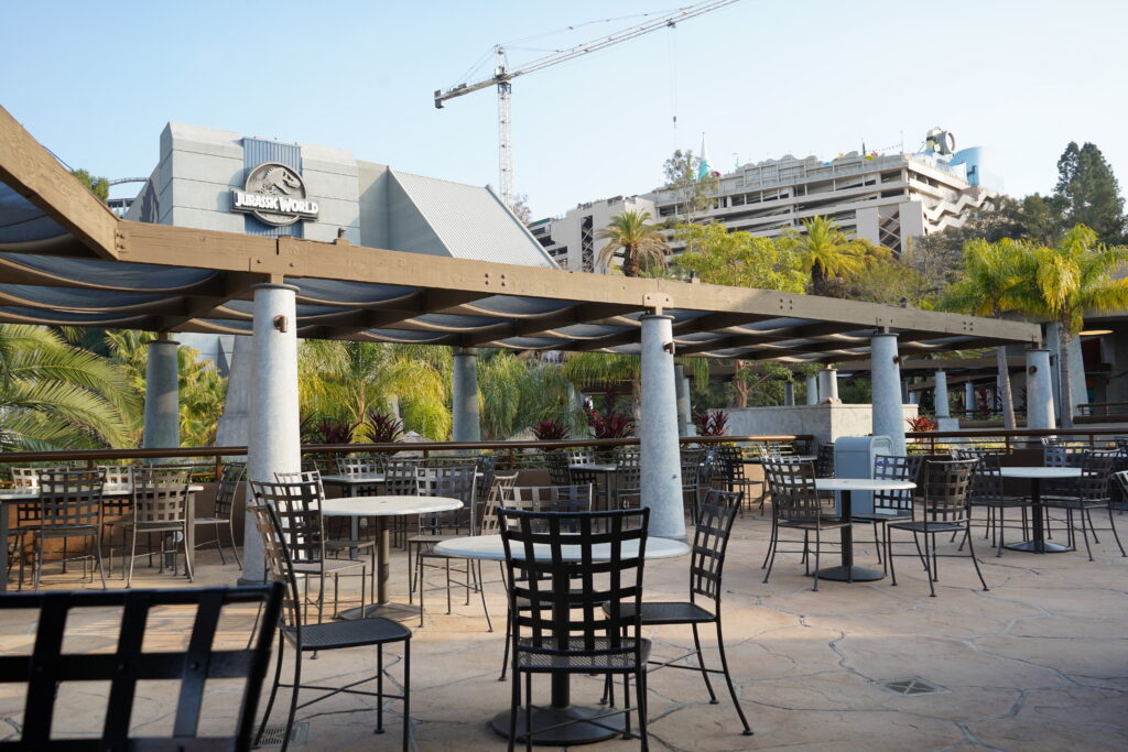 Patio seating area above Jurassic World at Universal Studios Hollywood.