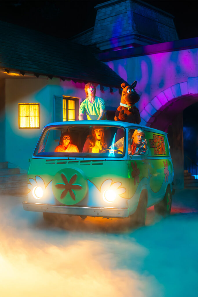 Mystery Inc driving the mystery machine through Little Europe