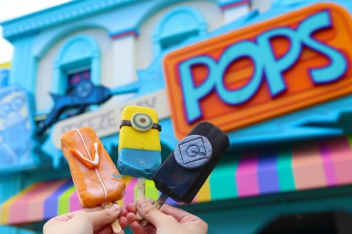 Three Freeze Ray Pops held up.