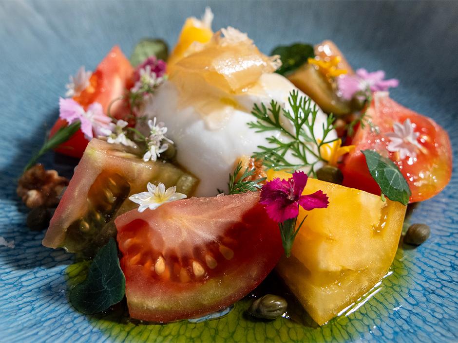 The Heritage Tomato and Burrata Salad at Universal Helios Grand Hotel.
