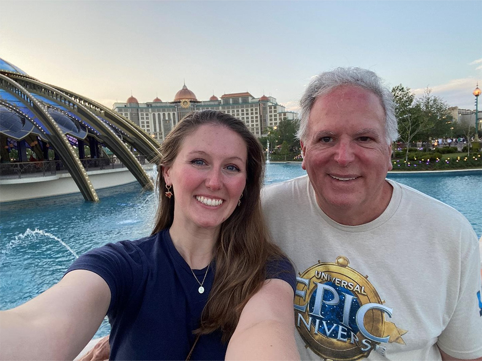Kaitlyn and her father smile in a selfie in Celestial Park